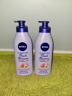 2 Nivea peach blossom and avocado oil lotion 16.9oz