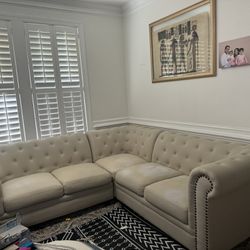 Sofa Set Eith A Grey Covertoo 