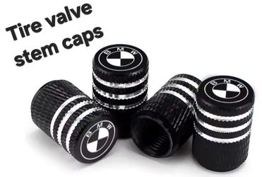 4 BMW tire valve stem caps.  Rim center caps/hood&trunk badges/door lites sold separately SHIPPING AVAILABLE