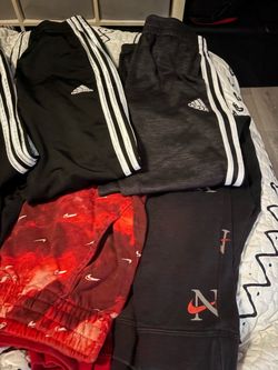 11 pairs of pants for boys size med-large