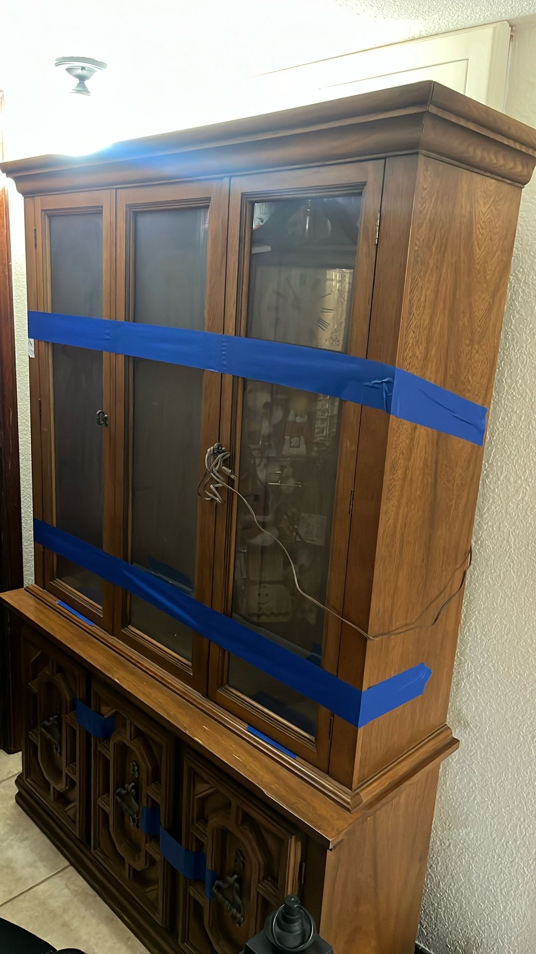 Curio Pecan Cabinet With 2 Glass Shelves And A Light In The Middle