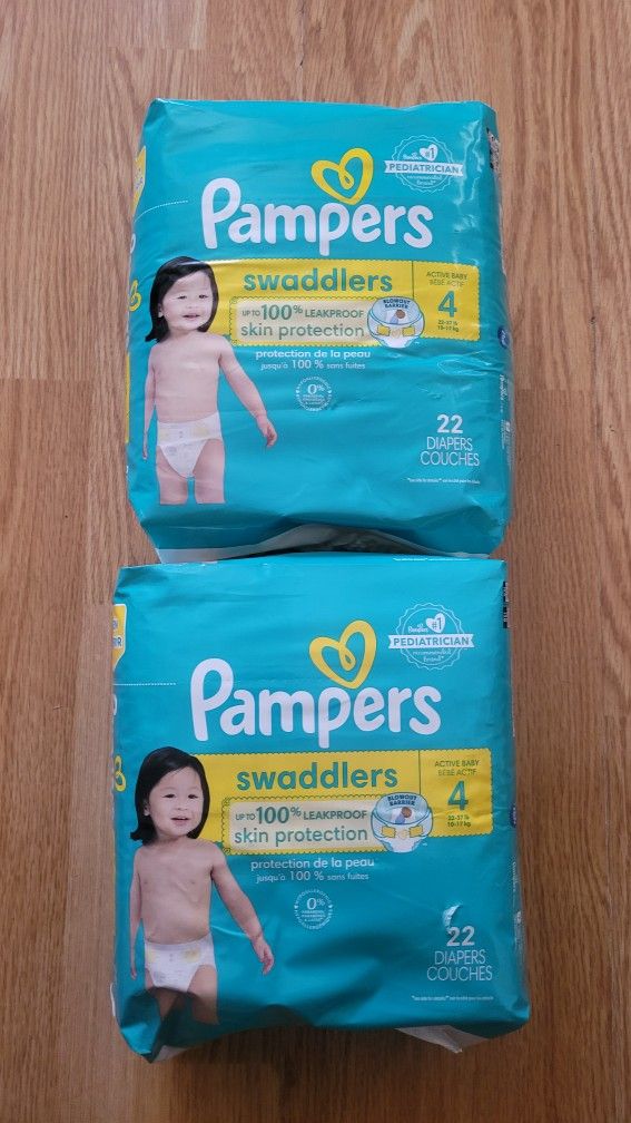 2 BAGS OF PAMPERS SWADDLERS SIZE 4/22 DIAPERS FOR $13/$13 POR LOS 2