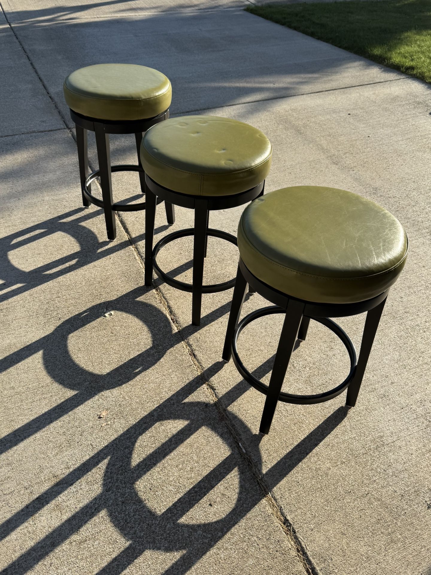 Three Safe Green And Black Swivel Bar Stools