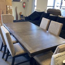 Rustic dining set 8 piece plus extras. Was $3599 now $1200. Clearance set can deliver