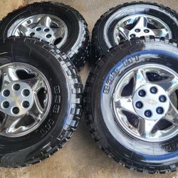 STOCK Rims And Tires  Rim's Chevy Silverado/Tahoe/Suburban/GMC/YUCON /  ALL MATCHING LT265/75/16 ACHILLES 838 MT TIRES 6 lugs 16 inch rims


Fits:  