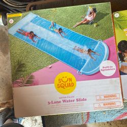 Water Slide 3 Lane New In Box. 2 Of Them 20$ Each Holly Area