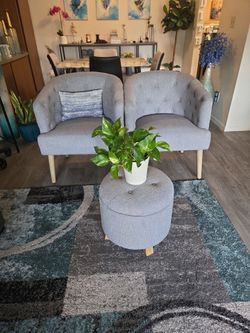 Two chairs with foot stool