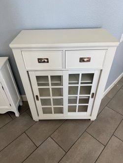 White Cabinet with Glass Sliding Doors