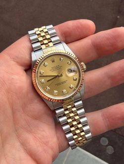 Rolex Datejust (ref. 16233) with diamond dial and 18K gold bezel,