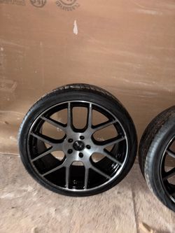 Black rims with tires 245/35 ZR 20