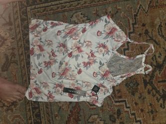 Brand new womens medium with $58.00 tags asking  $10.00