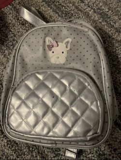 Small Backpack with dog head on it