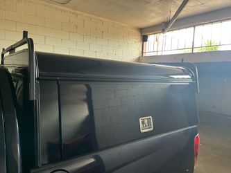 A.R.E. Camper shell with toolboxes
