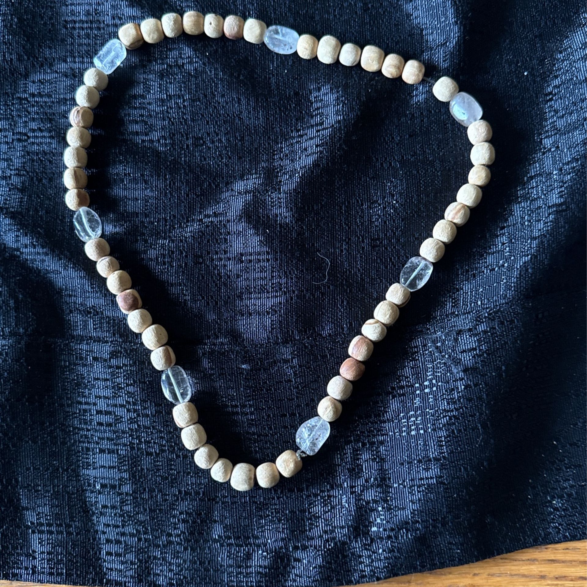 Palos santo and Rutilated Quartz Necklace.