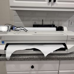 HP DesignJet T100, 2 New Paper Rolls, Less Than 40 Prints , Price Is Firm 