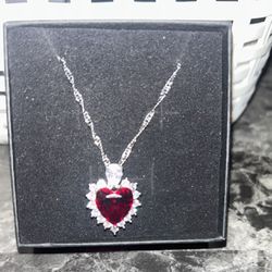 Heart Necklace Has Stones All Around 