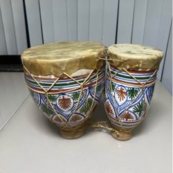 NORTH AFRICAN CERAMIC FOLK HAND PAINTED GREEN ,BROWN, BLUE PATTERN POTTERY AND ANIMAL HIDE BONGO DRUMS. Used in good condition with normal signs of us