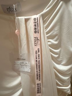 Asymmetrical body con whit oh Polly skit size 4
