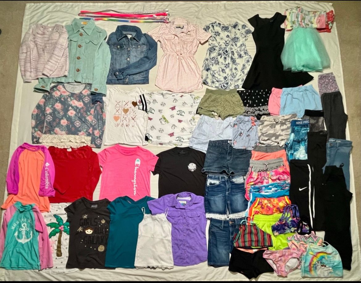 Bundle of 50 girls size medium 7/8 summer clothes, swim, shorts, tops, belts etc