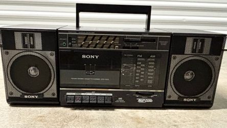 Cassette player/radio with speakers