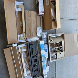 Tote Full Of Bathroom Accessories IE Tower Hangers And Many Other Items.