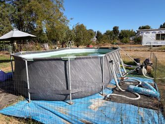 Bestway (Costco) above ground pool.  Has solar water heating pad.