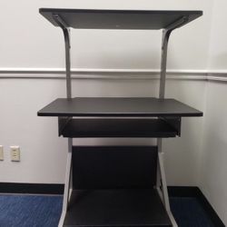 Adjustable Sit/Stand Mobile Workstation • Adjusts for use while standing or sitting.