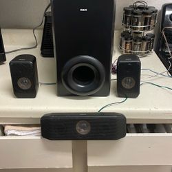 Rca Surround Sound System One Front Speaker, One Subwoofer Two Side Speakers