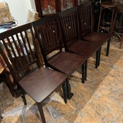 Four Wooden Table Chairs 