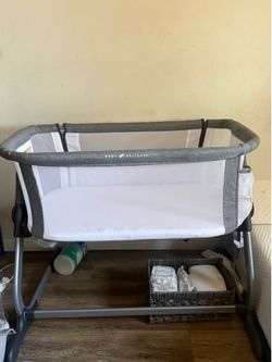 Baby delight beside me bassinet