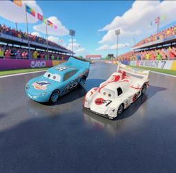 (Lot Of 2) Cars2 Dinoco-themed Lightning McQueen/Shu Todoroki Le Motor Prototype. Based on the visual evidence, these diecast cars are in used / Play-
