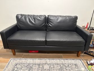 Black faux leather couch $50