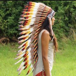 Replica/costume Quality. Native American Indian feather headdress war bonnet. Have a breastplate red/beige neck piece. 