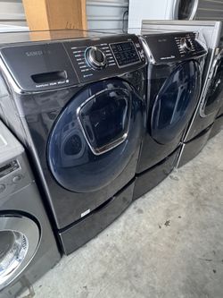 Black stainless color Front load Samsung washer and front load Samsung dryer electric with pedestals 