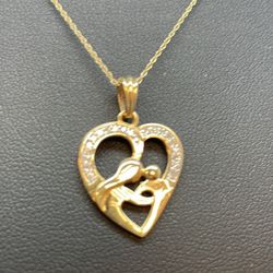 14k Gold  Diamond Heart Pendant . New
