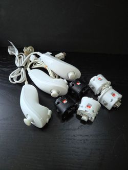 OEM Wii KUNCHUCK AND MOTION PLUS ADAPTER  knunchuck $10 EACH adapters  $15 EACH
