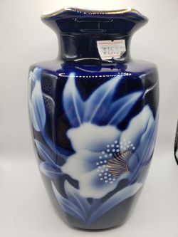 a vintage Japanese cobalt blue porcelain and ceramic vase.