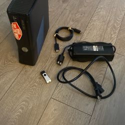 Xbox 360 + 64 gig flash drive 
