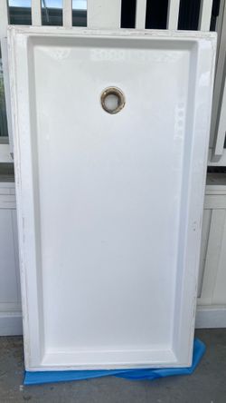 Shower pan very thick and heavy and soap shelf