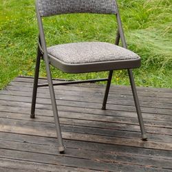 NEW FOLDING CHAIR, PADDED SEAT AND BACK, ALL STEEL CONSTRUCTION