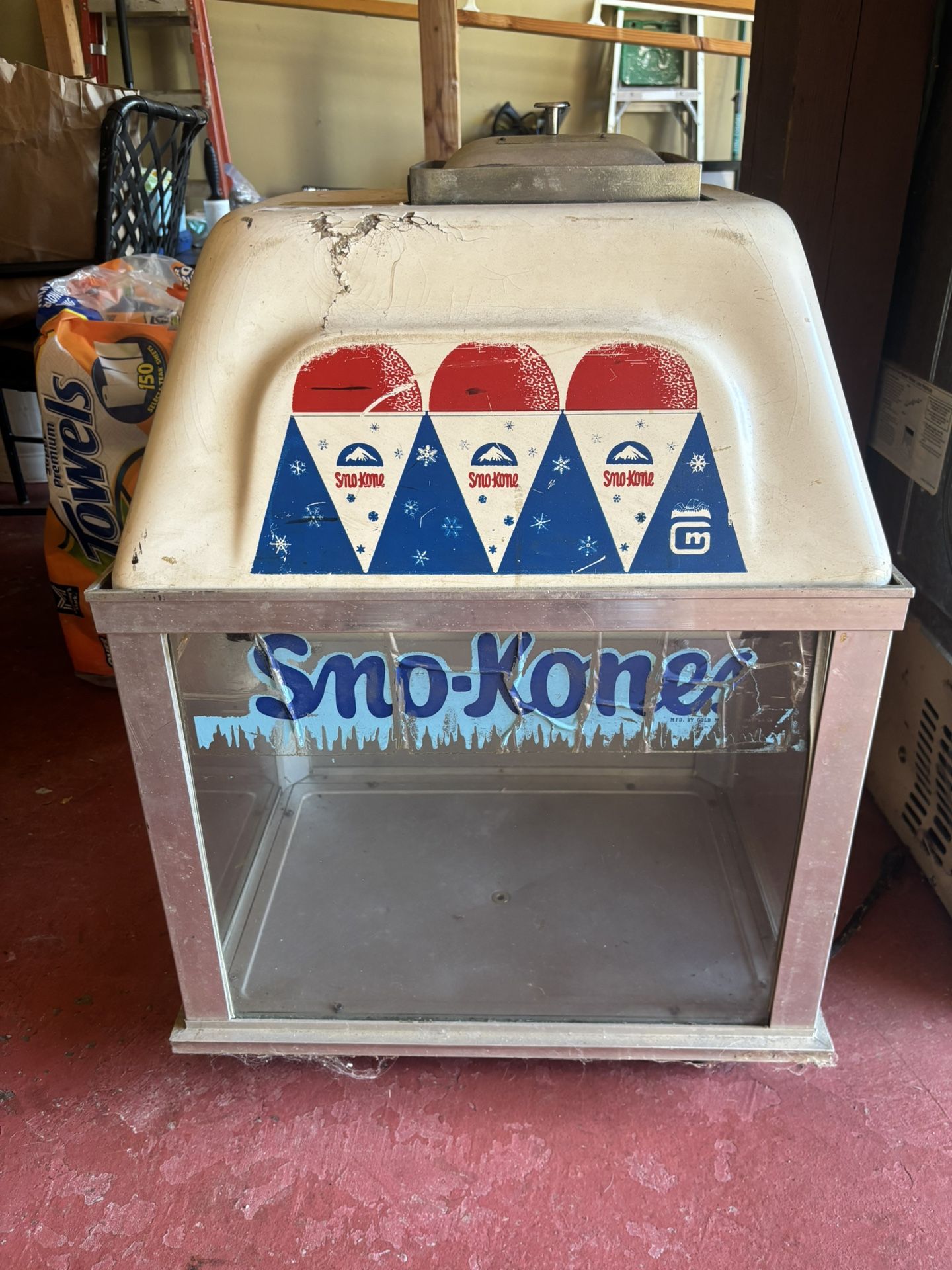 This image shows a vintage Gold Medal Sno-Kone machine, a commercial-grade for making snow cones