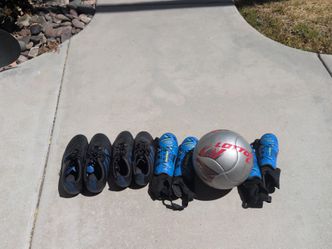 2 Soccer shoes  1 soccer ball and 2 shin guards