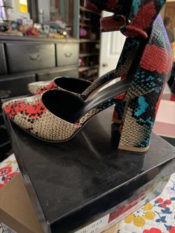 Snake print pumps