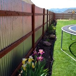 Metal And Wood And Vinyl Fence 