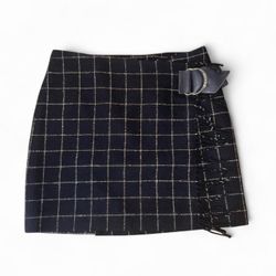 Vintage Ralph Lauren black and white 100% wool plaid mini skirt with fringe detail  size 6