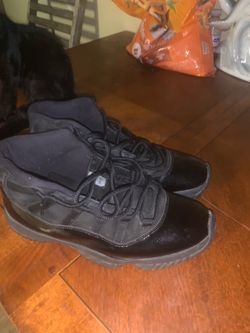 Air Jordan 11 Retro Black Sneakers