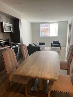 Dining Table and Cushioned Chairs