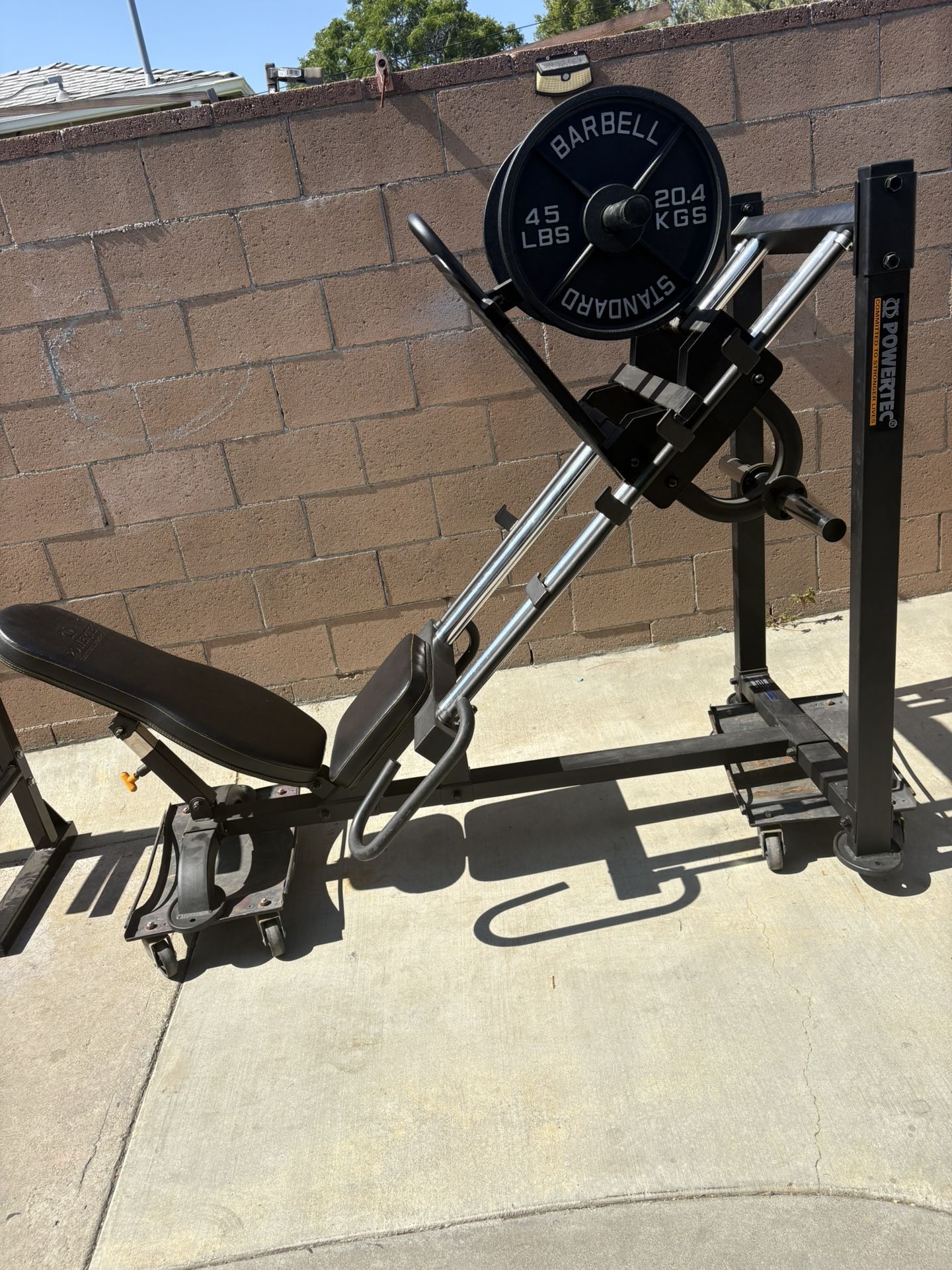 Powertec Leg Press In Good Condition Comes With A Pair Of Almost New Pair Of 45 Pounds Olympic Weights 
