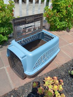 Small  medium dog/cat pet carrier cage with an opening top.
