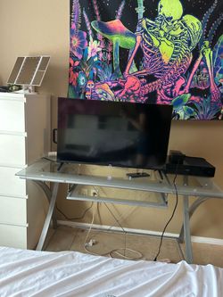 Glass desk with pull out drawer